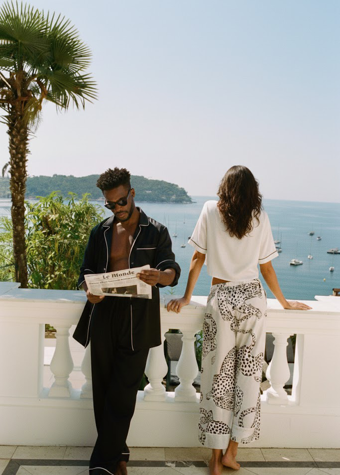 Couple enjoying a lifestyle of wellbeing on a balcony